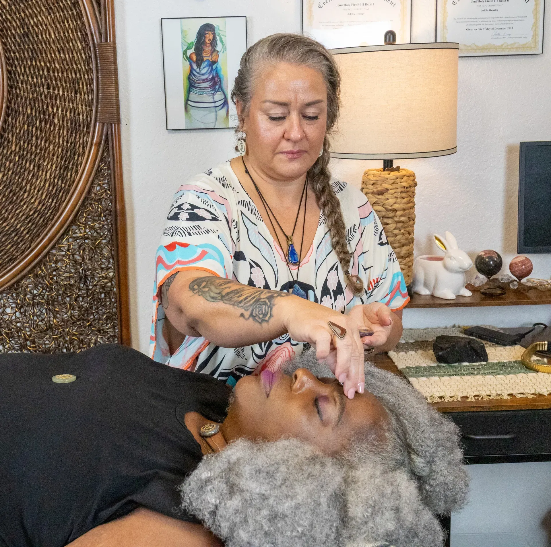 A Reiki healing session in a warm, professional sanctuary